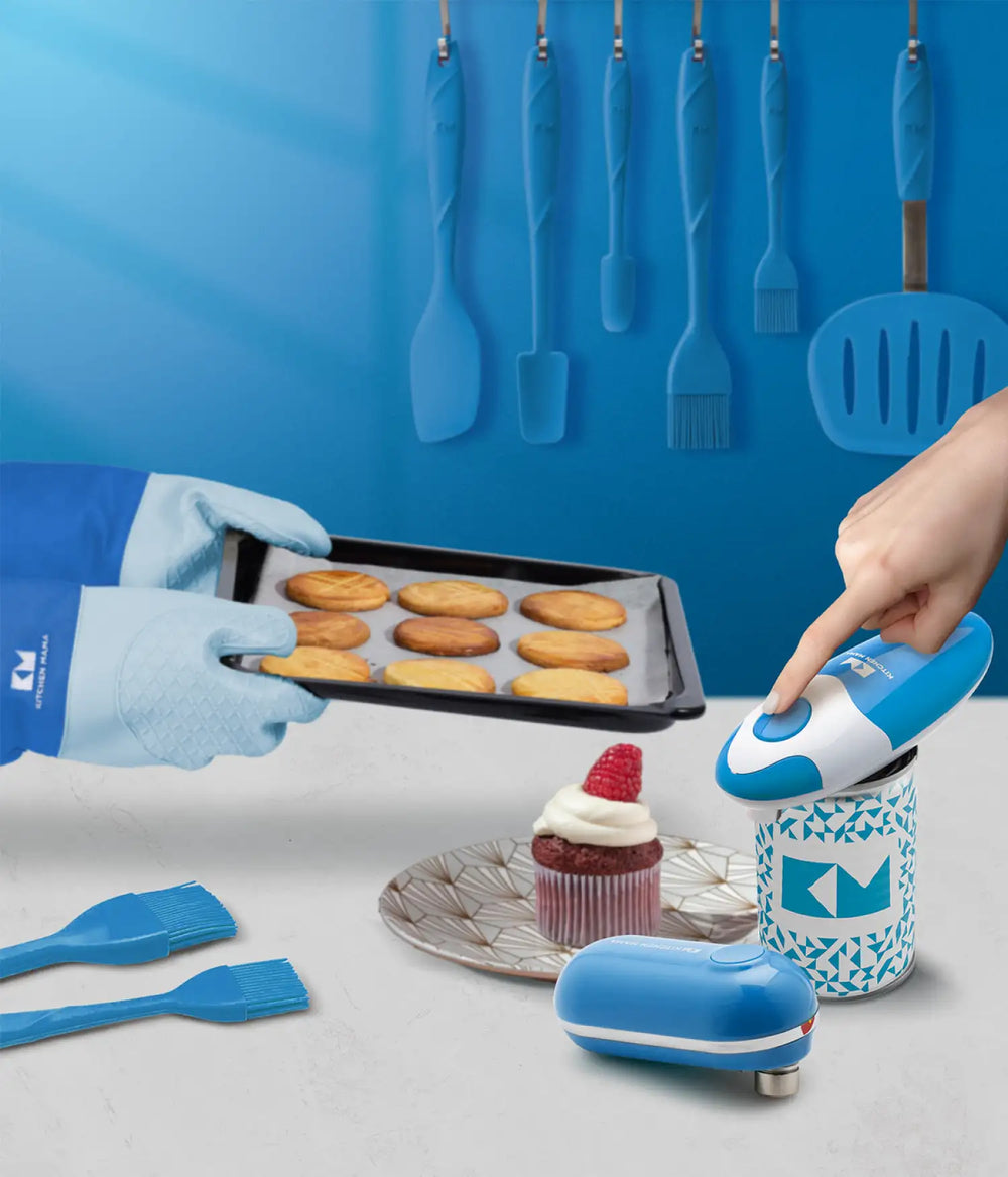 Kitchen Mama blue kitchen tools, including can openers, brushes, spatulas, and oven mitts, used while baking cookies and decorating cupcakes.