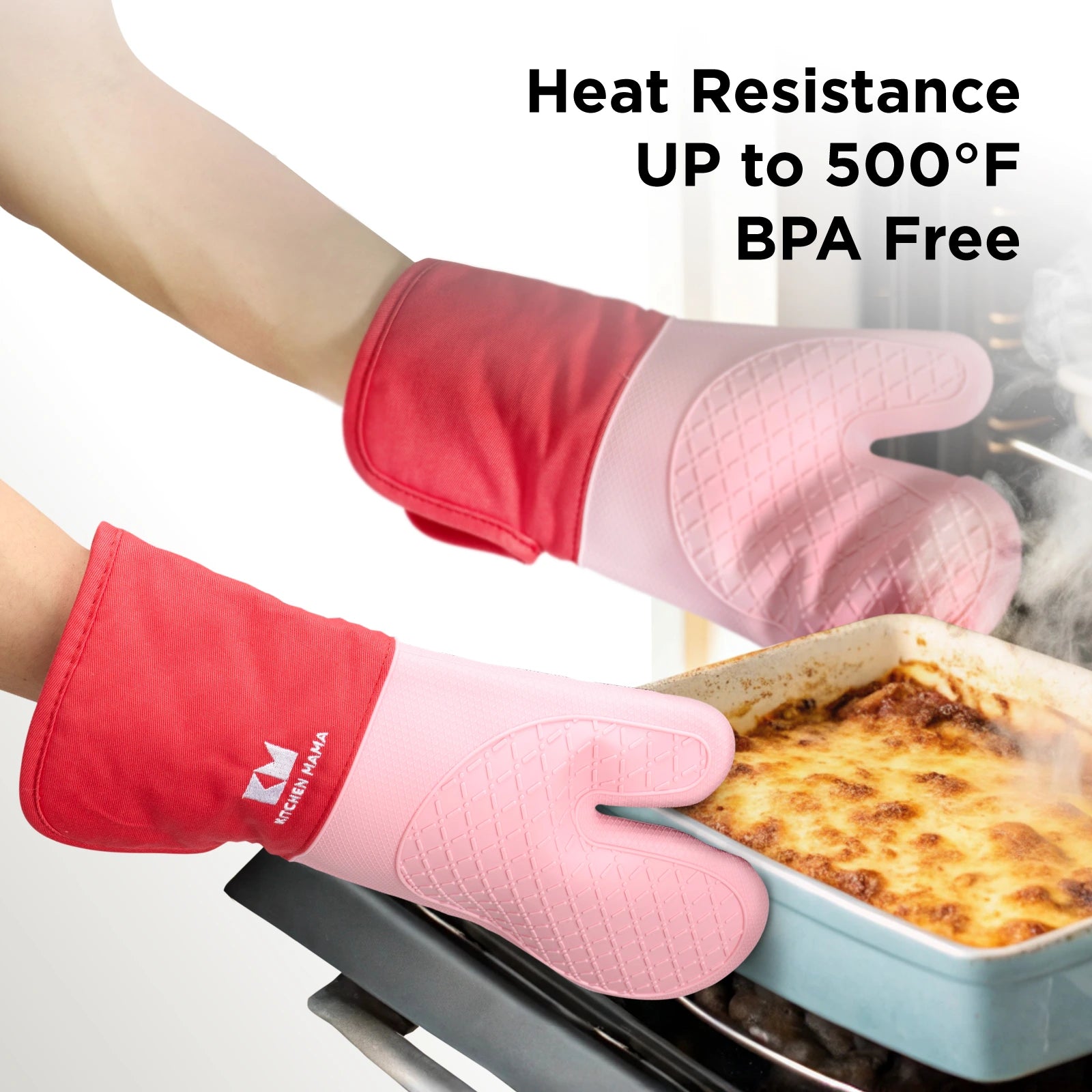 Hands wearing red and pink Kitchen Mama silicone oven mitts, safely removing a hot lasagna dish from the oven with visible steam. Text overlay reads 